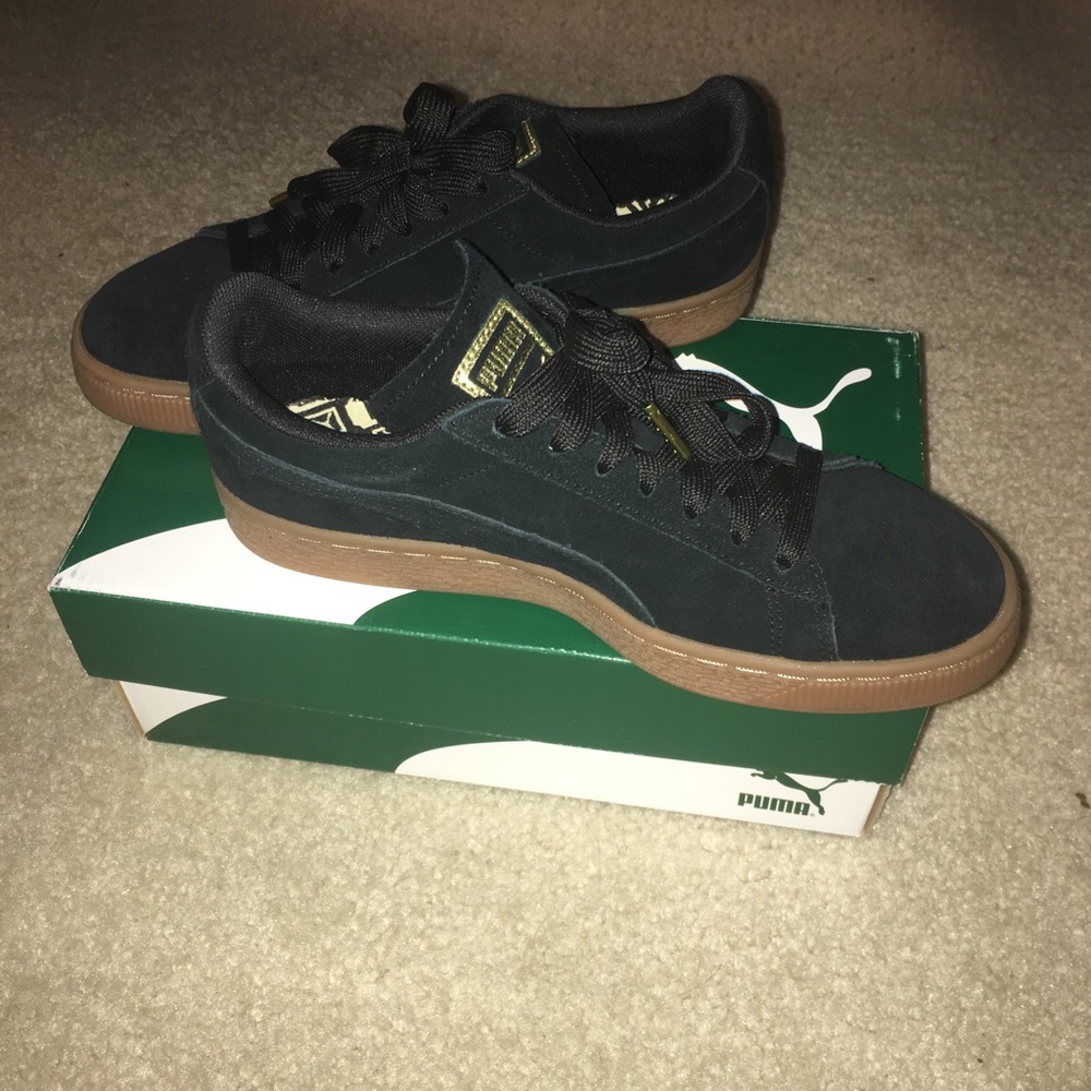 Black Puma Suedes